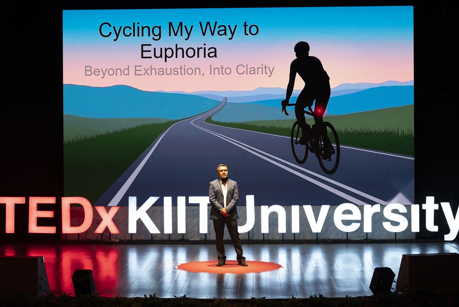Bharat Pannu opening his TEDx talk, Cycling My Way to Euphoria, at TEDx KIIT University