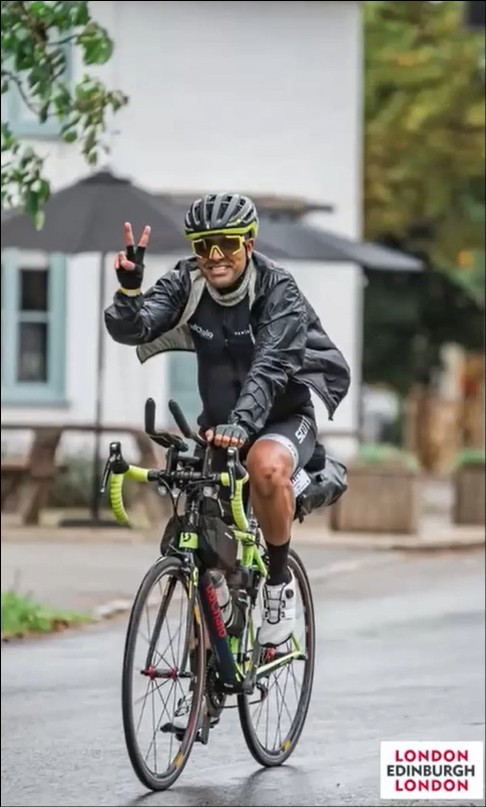 Official LEL 2025 race photograph — Bharat Pannu riding through a village